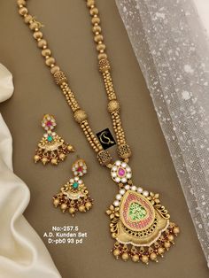 Description :- Wedding Necklace Sets || Bridal Jewelry || Indian Jewelry || Indian Long Necklace || Rani Haar Necklace || Kundan Set Gift yourself a royal look with this perfectly crafted kundan necklace set from Manalisstudio. Crafted with high quality kundan stones and pearls, it is impressive in design. The green enamel artwork adds perfect texture to the design. Perfect for weddings and festivities, this antique necklace set should be put on with your favorite sari or lehenga. 100% Satisfact Heavy Traditional Kundan Necklace For Marriage, Temple Necklace With Intricate Design For Marriage And Festivals, Intricate Temple Necklace For Marriage And Festivals, Temple Jewelry Bridal Necklace For Diwali Wedding, Temple Jewelry Bridal Necklace For Marriage During Diwali, Temple Jewelry Kundan Necklace With Meenakari For Marriage, Gold Zari Work Jewelry For Marriage, Traditional Kundan Necklace For Marriage And Festive Occasions, Festive Bridal Necklace For Marriage