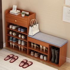 a wooden shoe rack with shoes and purses on it next to a white rug