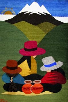 an image of three people sitting on the ground with mountains in the background and one person wearing a hat