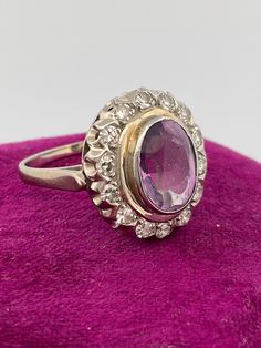 Welcome to Caviar and Cobwebs ! Thanks for stopping by. Enjoy browsing!  Stunning vintage Ring. Crafted from 18k white gold featuring a large Amethyst with a lovely purple hue, surrounded by Diamonds. This ring is in size 6.25, and is marked and tested. Minor facet abrasion on the Amethyst.  Perfect for a February birthday. Amethyst can be used to instill calmness and serenity, thus allowing for a more optimistic outlook.  Diamond details- .30ct single cut Diamond. clarity- si1 , colour- H   Gift wrapped and shipped safe and secure from Canada. Box for display purposes only* Luxury Vintage Amethyst Ring With Accent Stones, Luxury Vintage Amethyst Ring, Amethyst Ring Vintage 1stdibs, Luxury Oval Amethyst Ring In Art Deco Style, Luxury Purple Platinum Rings, Luxury Purple Amethyst Ring In Platinum, Luxury Purple Amethyst Platinum Ring, Formal Purple Platinum Rings, Oval Purple Amethyst Ring With 17 Jewels