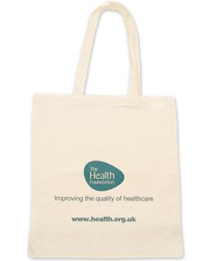 a white tote bag with the health trust logo on it