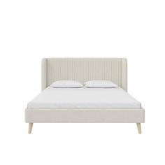 a white bed with two pillows on top of the headboard and one foot board