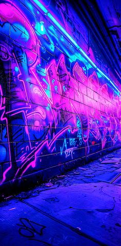 a wall covered in graffiti and neon lights