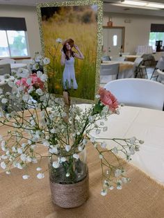 a vase filled with flowers on top of a table