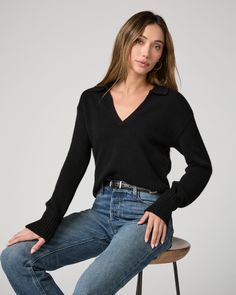 Crafted from Eco Cashmere, this black collared polo sweater features cuffed ribbed sleeves and a classic v-neckline. We'll be wearing this beauty with every shade of denim all season. Part of our Eco-Evolution collection, the Maxie Sweater was made from recycled materials to reduce our environmental impact and minimize waste. The goal of our sustainable efforts is to constantly evolve for the better. We are working hard to source environmentally responsible materials that don’t compromise our ex Black Polo Sweater With Collared Neckline For Workwear, Chic Collared Polo Sweater With Ribbed Cuffs, Black Collared Polo Sweater With Ribbed Cuffs, Fall Polo Sweater With Ribbed Cuffs And Collared Neckline, Fall V-neck Polo Sweater, Black Polo Sweater For Fall, V-neck Polo Sweater For Fall Workwear, Fall Workwear V-neck Polo Sweater, Fall V-neck Polo Sweater For Work