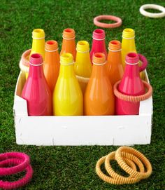 there are many different colored bottles in the box on the grass, and one is labeled color throwdown keyword ctd3888888