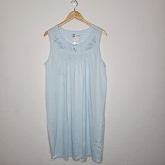 Ezi Blue Sleeveless Nightgown With Embroidered Flowers Along Neckline. Size Xl, But Runs Small. Brand New With Tags. 55% Cotton, 45% Polyester Pull On Closure Machine Wash Cold, Tumble Dry Low Sleeveless Light Blue Cotton Sleepwear, Sleeveless Blue Nightgown With Lace Trim, Blue V-neck Nightgown For The Beach, Button Down Sleep Shirt, Blue V-neck Sleepwear With Lace Trim, Blue V-neck Nightgown With Lace Trim, Tie Dye Loungewear, Womens Christmas Pajamas, Purple Drinks