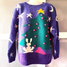 Fun and stylish wool sweater by an American Company Brass Plum Nordstrom.  The sweater is thick and fluffy. Made from Shetland lambswool, it will keep you warm during cold winter days. The sweater features a fun print with a Christmas tree, a rabbit, moon and stars. The sweater is royal blue with green, pink, yellow and white colors. The sweater is in excellent/mint condition and will make a cool gift! It is good for size US10, however, size US8 will also be great. It measures: From collar to sh Violet Rose, Designer Sweater, Bleu Violet, Pink Christmas Tree, Wool Winter, White Colors, Winter Days, Sweater Design, Winter Sweaters