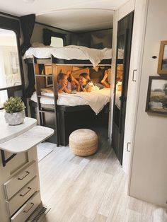 the bunk beds in this rv are full of people