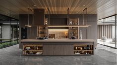 an open kitchen with wooden cabinets and counter tops, along with sliding glass doors leading to the outside