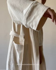 Full length robe made in our luscious, double sided terry. Lightweight and non restrictive, this organic knit has a stretch made for ultimate comfort. Belt stays secure without feeling restricted, sleeves stay rolled up, without feeling bulky. Made in organic cotton imported from Portugal, this double faced knit features a fast drying terry loop exterior and soft brushed interior. PRODUCT CODE: ROBE02/TF01.002 MORE DETAILS 100% ORGANIC COTTON DOUBLE FACE BRUSHED/TERRY LOOP TONAL MONOGRAM EMBROID Neutral Loungewear, Embroidery Belt, Terry Robe, Lounge Robes, The Embrace, Face Brush, Comfy Fashion, Double Face, Crop Shirt