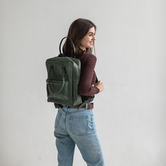 This leather city backpack is a perfect accessory for your everyday needs. Made from high-quality leather, it is durable and built to last. The backpack features multiple pockets and compartments to keep your belongings organized and easily accessible. The main compartment is spacious enough to fit a laptop, books, and other essentials. The adjustable straps provide comfortable carrying, while the top handle allows for easy grab-and-go convenience. The backpack is designed with a timeless style that will complement any outfit, making it suitable for both work and casual use. Upgrade your wardrobe with this stylish and functional leather backpack! Dimensions: Height - 13 inch / 33 cm  Width - 10.43 inch / 26.5 cm  Depth - 4.13 inch / 10.5 cm Leather Everyday Backpack, Everyday Leather Standard Backpack, Modern Backpack With Leather Lining For Everyday, Soft Leather Backpack For Commuting, Leather Backpack With Waxed Finish For On-the-go, Modern Everyday Backpack With Waxed Finish, Everyday Leather Backpack With Waxed Finish, Leather Backpack With Waxed Finish, Leather Backpack For Commuting