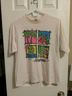 Vintage Bhakti Plus Hawaii Tee-shirt Sz Large. Shipped with USPS First Class and if any measurements are needed before purchasing please reach out! All defects/stains have been noted in the photos above. PLEASE BE SURE THAT YOU LIKE THIS ITEM BEFORE COMMITTING TO BUY IT AS ALL SALES ARE FINAL!! White Crew Neck Top With Vintage Print, Pink Retro Top With Relaxed Fit, Vintage Pink Crew Neck Tops, White Vintage Print Crew Neck Top, Retro Pink Relaxed Fit Top, 90s Style White Tops With Vintage Print, Pink Retro Relaxed Fit Top, 90s Style White Shirt For Summer, Pink Retro Shirt With Relaxed Fit