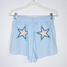 Wildfox Light Blue Shorts With Star Embroidery At Back. Elastic Waist. New With Tags. Offers Welcome. No Trades. Bundle For Discount. Casual Cotton Bottoms With Star Print, Cute Shorts For Summer Pajama Party, Trendy Blue Bottoms With Star Patch, Blue Shorts For Pajama Party With Elastic Waistband, Trendy Blue Summer Pajama Shorts, Blue Shorts With Elastic Waistband For Pajama Party, Cute Summer Bottoms For Pajama Party, Blue Shorts With Star Print, Blue Star Print Short Bottoms