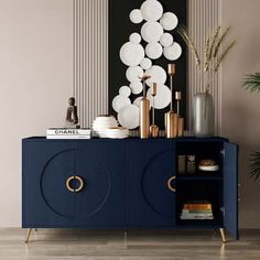 a blue cabinet with white balloons hanging from it's side and some books on top