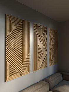 three wooden panels on the wall in a living room