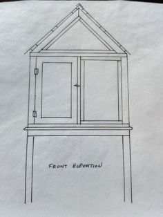 a drawing of a house on top of a piece of paper that says front elevation