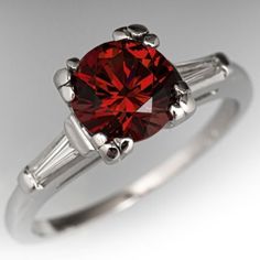 Elegant Ruby Ring With Accent Stones, Elegant Ruby Ring With Diamond And Polished Finish, Classic Platinum Ruby Ring With Prong Setting, Elegant Ruby Ring With Round Accent Stones, Classic Platinum Ruby Ring With Center Stone, Classic Ruby Ring With Polished Round Stone, Classic Ruby Ring With Prong Setting In Platinum, Classic Red Diamond Platinum Ring, Timeless Red Rings With Brilliant Cut