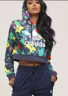 100% AUTHENTIC BRAND NEW!!! Adidas Original Women Cropped Blossom of Life Graphic Hoodie Size Small ED6592 DESCRIPTION Don't be fooled, florals can be groundbreaking. Theadidas Originals Blossom of Life Floral Cropped Hoodie Sweatshirt is a long sleeved, soft knit, athletic inspired hoodie complete with a cropped hem, drawstring neckline, attached hood and the brand's signature trefoil logo resting upon a multicolored, floral patterned base. Rock with a matching pair of leggings and chunky sneak Athleisure Street Style, Drop Shoulder Hoodie, Adidas Tracksuit, Adidas Original, Nike Fleece, Adidas Sweatpants, Adidas Originals Women, Oversized Crewneck, Crop Hoodie