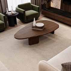 a living room filled with furniture and a flat screen tv on top of a wooden table