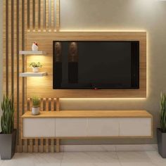 modern living room with wood paneling and white walls, tv on the wall, potted plants in front of it