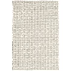 a white rug with small squares on it