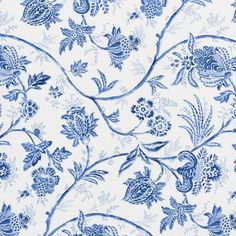 a blue and white wallpaper with floral designs on the outside, including leaves and flowers