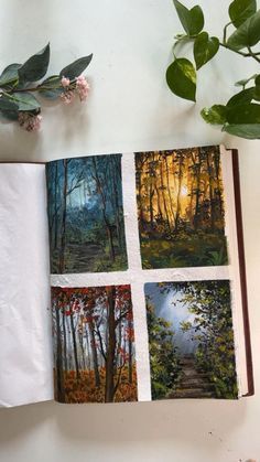 an open book with pictures of trees and leaves on it next to a potted plant