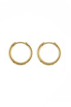 Classic with a twist. These 18mm diamond hoops are the ultimate in versatile sparkle. Dress them up or down, they’re perfect for any occasion and made from waterproof 18K gold over stainless steel, featuring stones that shine like real diamonds. Waterproof💧💧💧 Stainless Steel and Cubic Zirconia Crystals 18K Gold Hypoallergenic Nickel Free SIZE: 18mm Diameter Gold Diamond Hypoallergenic Hoop Earrings, Everyday Gold Hoop Earrings With Sparkling Stones, Watch Band Bracelet, Gentle Fawn, Sparkle Dress, Band Bracelet, Chain Anklet, Mink Pink, Show Me Your Mumu