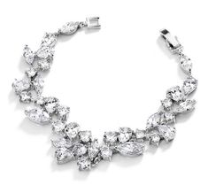 Stunning%20CZ%20Wedding%20Bracelet%20%0D%0AThis%20dazzling%20cubic%20zirconia%20bracelet%20is%20a%20wonderful%20choice%20for%20the%20bride%20with%20a%20smaller%20wrist%20size!%26nbsp%3BThis%20glamorous%20bracelet%20blends%20cz%20cuts%20of%20pear%2C%20marquise%20and%20round%20shapes%20in%20an%20elegant%2C%20sparkling%20design.%20%20This%20silver%20rhodium%20plated%20bracelet%20is%20perfect%20for%20the%20modern%20bride%20and%20is%20also%20great%20for%20mothers%20of%20the%20bride%2C%20prom%20or%20pageants.%20%0D%0APetite%20Size%3A%206%201%2F2%22%20long%20-%20designed%20for%20small%20wrists%20-%20and%20about%203%2F4%22%20wide.%0D%0AColor%3A%20Silver%2FClear.%0D%0AStyle%3A%204129b.%0D%0AAlso%20available%20in%2014K%20gold%20plating%20as%204129b-G.%0D%0APlease%20allow%201%20week%20for%20delivery. Diamond Band Rings, Prom Fashion, Prom Accessories, Cuff Bracelets Handmade, Locket Bracelet, Bridal Earrings Drop, Essential Oil Diffuser Bracelet, Cubic Zirconia Bracelet, Bracelet In Silver