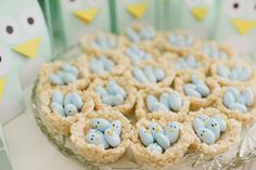 there are many cookies with blue birds on them