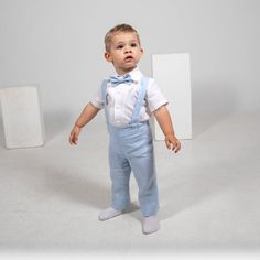 Baby boy linen outfit includes SET of 4 :- Shirt - Pants- Suspenders - Bow tie Pants come in elastic waist adjustable with buttons. Suspenders are adjustable with buttons on the back and are removable. The bow tie is pre-tied with adjustable Velcro closure on the back. There is possible to order a short or long sleeve shirt, if not specified it will be made short sleeve as seen in the photo.The color of the shirt is white. Bow tie and pants with suspenders can be ordered in different colors.In t Baby Boy Linen, Bow Tie Pants, Pants With Suspenders, Boys Formal Wear, Baby Blue Weddings, Light Blue Suit, Boy Baptism Outfit, Linen Outfit