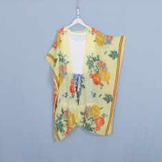 Welcome to my shop, I am in China. It will need around 30 days for international orders. Please consider the time when placing order. Long bohemian kimono,perfect for a casual day out or as a swimsuit cover up. Material: soft polyester fabric,comfortable One size fit all: Width: 35.5 inches (90cm) Side length: 42 inches (107cm) Back length:35.5 inches (90cm) CARE: Wash gently by hand in cold water. Single wash. Don't press! Hang to dry. Maybe you will like other items in my shop, find them here: Hippie Printed Kimono For Beach Cover-up, Hippie Kimono With Kimono Sleeves For Beach Season, Summer V-neck Kimono Free Size, Bohemian Floral Print Robe For Vacation, Oversized V-neck Summer Kimono, Bohemian Robe With Floral Print For Vacation, Bohemian Open Front Summer Robe, Yellow Kaftan For Beach Cover-up, Hippie Style Free-size Kimono Beach Cover-up