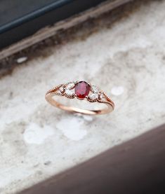 Vintage Ruby Ring Settings, Ruby And Diamond Ring Engagement, Engagement Rings With Ruby Accents, Unique Engagement Rings Ruby, Classic 14k Rose Gold Ruby Ring For Anniversary, Oval Rose Gold Ruby Ring With Rose Cut Diamonds, Elegant Wedding Ruby Ring With Diamond Cut, Oval Birthstone Ring With Rose Cut Diamonds For Promise, Promise Oval Birthstone Ring With Rose Cut Diamonds