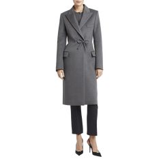 Valentino Garavani overcoat with a bow closure Peak lapels; double-breasted Long sleeves Chest welt pocket; waist flap pockets Straight silhouette Back walking vent Virgin wool/cashmere Made in Italy Valentino Garavani, Double Breasted, Cashmere, Tops Designs, Wool, Luxury Fashion, Long Sleeve