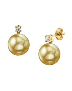 These exquisite pearl earrings feature two 10mm AAA Quality Golden South Sea pearls, hand-picked for their incredible luster and overtones. The pearls are mounted on the finest 14K gold with dazzling SI clarity diamonds.
These earrings come packaged in a beautiful jewelry gift box, perfect for gifting. Timeless Gold Diamond Pearl Earrings, Elegant Gold Pearl Earrings Brilliant Cut, Elegant Gold Pearl Earrings With Brilliant Cut, Gold Brilliant Cut Pearl Earrings, Formal Gold Diamond Earrings With Pearls, Formal Gold Pearl Diamond Earrings, Baroque Pearls Necklace, Large Pearl Earrings, South Sea Pearls Earrings