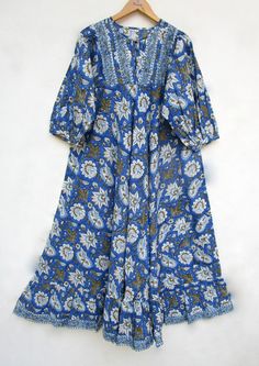 ITEM DESCRIPTION cotton royal blues printed long maxi dress - Henley neckline with buttons summer maxi dress  - 3/4th sleeve with button dress Features: 3/4th sleeve, Henley neck, Long dress Fabric : 100% Cotton cambric hand block print fabrics   Sleeve Length = 18 inch For more sizes & their measurement, please refer our below chart to understand the sizes variations available with us For your size requirement, please mention your size in seller note at the time of buying. SIZE MEASUREMENT  BUSTLENGTHSHOULDER XXS34 inch51 inch13.5 inch XS36 inch51 inch14 inch S38 inch51 inch14.5 inch M40 inch51 inch15 inch L42 inch51 inch16 inch XL44 inch51 inch16.5 inch 2XL46 inch51 inch17 inch 3XL48 inch51 inch18 inch   Company Return Policy:  Please write for more information to my email directly CHOOS Button Maxi Dress, Ethnic Print, Maxi Robes, Blue Hand, Summer Maxi, Block Printing Fabric, Button Dress, Long Maxi, Summer Maxi Dress