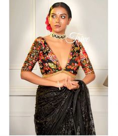 Made To Order Indian Designer Black Embroidered Georgette Saree Lehenga Blouse Deep V Neck  Lehenga Blouse Elbow Length Sleeves  This Made to Order/Made to Measurement/Custom Made Indian Ethnic Blouse. - Fabric - Embroidered Georgette - Color - Black   - Princess Cut - Rich Lined -  elbow sleeves - Extra margin and extra stitches included in the blouse - It can be customize in any color, design or size  PLEASE NOTE: BUYERS ARE RESPONSIBLE FOR ANY CUSTOMS AND IMPORT TAXES THAT MAY APPLY. This is V Neck Blouse Designs For Lehenga, Black Embroidered Party Blouse, Black Floral Embroidered Lehenga For Diwali, Black Lehenga With Floral Embroidery For Diwali, Black Semi-stitched Blouse Piece With Intricate Embroidery, Semi-stitched Black Blouse Piece With Intricate Embroidery, Black Fitted Saree With Intricate Embroidery, Designer Black Blouse Piece With Intricate Embroidery, Black Embroidered Blouse Piece For Reception