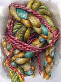 an artistic drawing of yarn wrapped in red, green and yellow colors on white paper