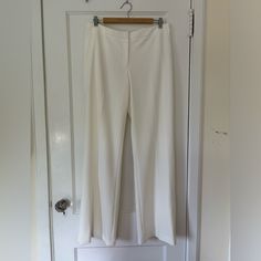 Calvin Klein Straight Fit Pant Beautiful Cream Color (How Cute For A Bridal Shower Or Dinner Rehearsal!?) Size 10 Double Lined So Not See Through Slits On The Sides Of Each Pant Leg Unfortunately No Pockets (Back Ones Are Fake) So Mad It Doesn’t Fit Me Anymore :( Washed But Never Worn (Was Hoping I Would Go Back To A Size 10) Zipper, Button And Clasp Front Gorgeous Pant Tailored White Wide-leg Dress Pants, White Tailored Wide-leg Dress Pants, Elegant Calvin Klein Straight Dress Pants, Calvin Klein Wide Leg Bottoms For Spring, Chic Wide Leg Calvin Klein Pants, Chic Calvin Klein Wide Leg Pants, Chic Calvin Klein Straight Pants, Elegant Calvin Klein Bottoms For Spring, Elegant Stretch White Pantsuit