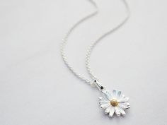 This Pendant Necklaces item by tinysilver has 370 favorites from Etsy shoppers. Ships from United Kingdom. Listed on Jun 19, 2024 Daisy Pendant, Daisy Necklace, Gold Details, Matching Earrings, Sterling Silver Chains, Lovely Gift, Pendant Necklaces, Beautiful Necklaces, Silver Pendant