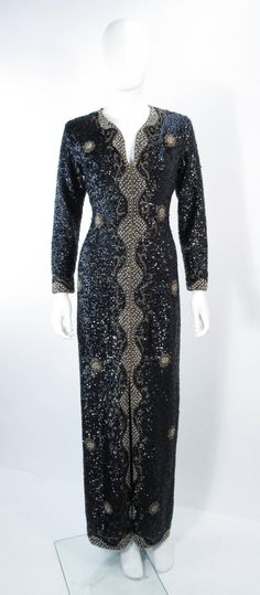 Sequined Evening Dress For Winter, Vintage Evening Dresses For Festive Season, Embellished Fitted Evening Dress For Winter, Winter Evening Fitted Sequin Dress, Vintage Black Fitted Sequin Dress, Vintage Fitted Black Sequin Dress, Black Fitted Vintage Sequin Dress, Vintage Evening Dress With Long Sleeves, Fitted Sequin Dress For Formal Winter Events