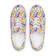 JellyBean Women's lace-up canvas shoes are custom-made upon ordering. We apply the print directly to the shoe fabric and then they are sewn together to create this colorful and fun shoe. You can't find this in any store! No closet is complete without a pair of sneakers. Step up your shoe game with these women's lace-up canvas shoes and rest assured that your outfit will be polished to perfection.  * 100% polyester canvas upper side * Ethylene-vinyl acetate (EVA) rubber outsole * Breathable linin Multicolor Canvas Shoes With Rubber Sole And Round Toe, Multicolor Canvas Shoes With Rubber Sole, Low-top Fabric Canvas Shoes With Rubber Sole, Multicolor Canvas Sneakers With Laces, Multicolor Canvas Sneakers With Round Toe, Multicolor High-top Canvas Shoes With Laces, Multicolor Low-top Cotton Sneakers, Casual Custom Lace-up Sneakers With White Laces, Multicolor Low-top Fabric Sneakers