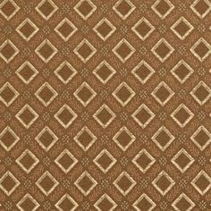 an upholstered brown and beige area rug with diamond shapes on the bottom half