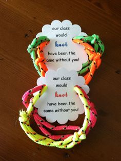 three colorful bracelets with words on them