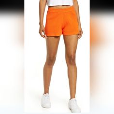 Eadie High Waist Rib Shorts In Orange Combining Sporty Ease With Classic Versatility, These High-Rise Shorts In A Soft Rib Knit Are Ones You'll Choose To Wear Again And Again. Orange Bottoms With Built-in Shorts For Loungewear, Sporty High-waist Cotton Athletic Shorts, Sporty High Waist Cotton Athletic Shorts, Sporty High Waist Cotton Shorts, Athleisure Bottoms With Elastic Waistband For Day Out, High Waist Cotton Sports Shorts, Spring Sports Bottoms Short Length, Relaxed Fit Athleisure Bottoms For Day Out, Casual High Waist Shorts With Ribbed Waistband