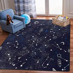 a child's room with a blue chair and rug