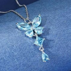 Elevate Your Fashion Statement And Add A Touch Of Elegance To Your Outfit With This Stunning Butterfly Pendant Necklace From Shein. The Necklace Features A Beautiful Butterfly-Shaped Pendant Adorned With Blue Cubic Zirconia Stones That Sparkle Under Any Light. Made Of High-Quality Stainless Steel, The Necklace Is Sturdy And Durable, Ensuring It Will Last A Long Time. With A Necklace Length Of Approximately 8 Inches Plus A 2-Inch Extender, It Is Perfect For Any Occasion, From A Casual Day Out To Blue Clavicle Chain Necklace For Wedding, Elegant Blue Crystal Necklace For Gift, Elegant Blue Pendant Crystal Necklaces, Elegant Blue Pendant Crystal Necklace, Elegant Blue Crystal Pendant Necklace, Elegant Blue Sterling Silver Crystal Necklaces, Elegant Blue Crystal Sterling Silver Necklace, Elegant Blue Sterling Silver Crystal Necklace, Elegant Light Blue Crystal Necklace Gift