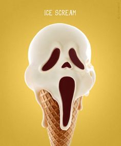 an ice cream cone with a ghost face sticking out of it's center,