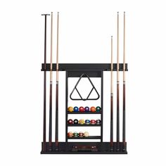 a rack with pool balls and cues in it on top of a white background